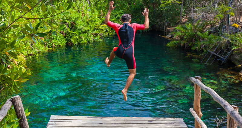 Jumping into a Cenote in Cancun