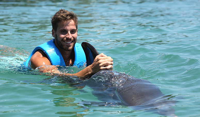 Getting ride by a dolphin