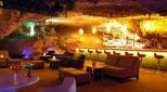 Get a welcome drink at Alux bar
